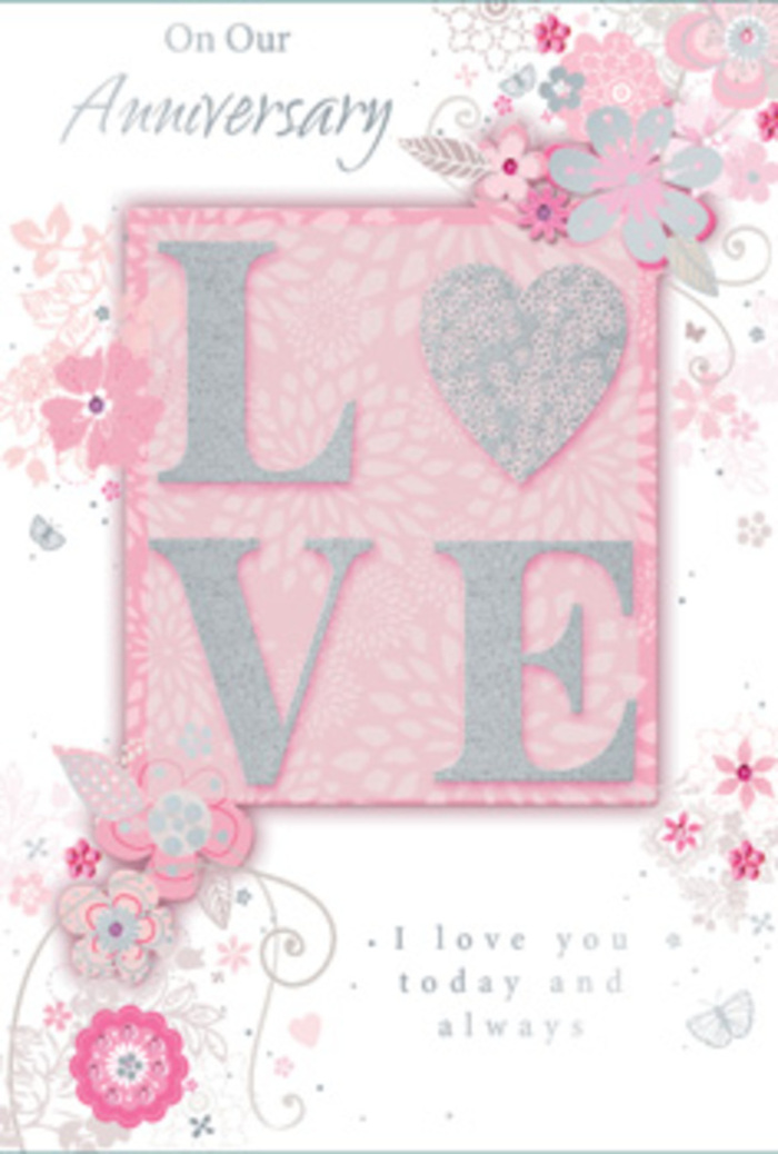 The anniversary card depicted here feels like a quiet love letter crafted in paper, its refined details reminiscent of a bespoke bouquet prepared for a celebration in Pinner. At the centre, the word LOVE is embossed in generous, capital letters, each one lifted from the card's surface and finished with a fine dusting of soft, blush-pink glitter edged in silver. The texture appears velvety and inviting, encouraging a gentle touch much like the first brush of fingers over a cluster of freshly arranged roses. Behind and around the word, the background drifts between gentle blush, pearly white, and barely-there grey, creating a calm, luminous field that lets the central motif shine. Encircling the letters is a border of wispy, hand-drawn blooms and sprays of foliage that feel as though a florist has translated an arrangement into a delicate sketch. The flowers open in harmonised tones of pink, muted lilac, and creamy ivory, their contours defined by fine lines and subtle shading that suggest depth without heaviness. Slender stems curl in graceful arcs, weaving around petals and leaves the way greenery twists naturally through a hand-tied bouquet delivered to a house near Pinner High Street. Tiny ornamental flourishes and near-hidden butterflies are tucked into the design, giving the card a sense of gentle motion and quiet joy. An understated anniversary message, scripted in an elegant, flowing typeface, sits near the base or to one side, carrying sentiments of lasting love and shared days. The composition feels balanced and airy, like a room lit by soft afternoon light, making this card a tender keepsake for marking another year of companionship in Pinner.